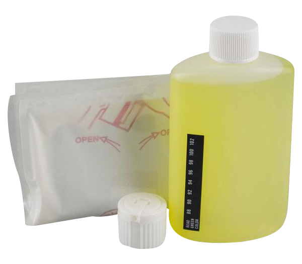 A front view of the 3.5oz Synthetix5 Fetish Urine bottle next to its open packaging, showing a clear plastic container.