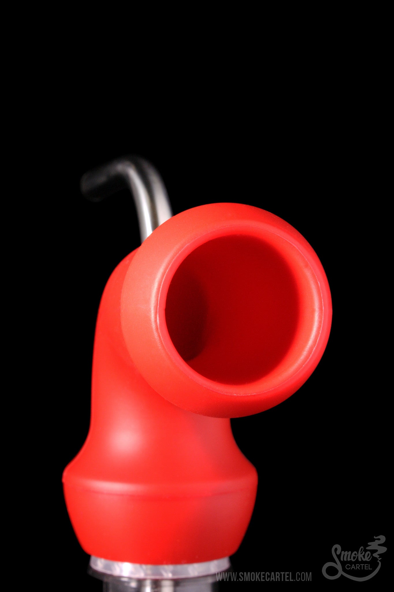 Red silicone oil rig bubbler with a glass downstem against a black background.