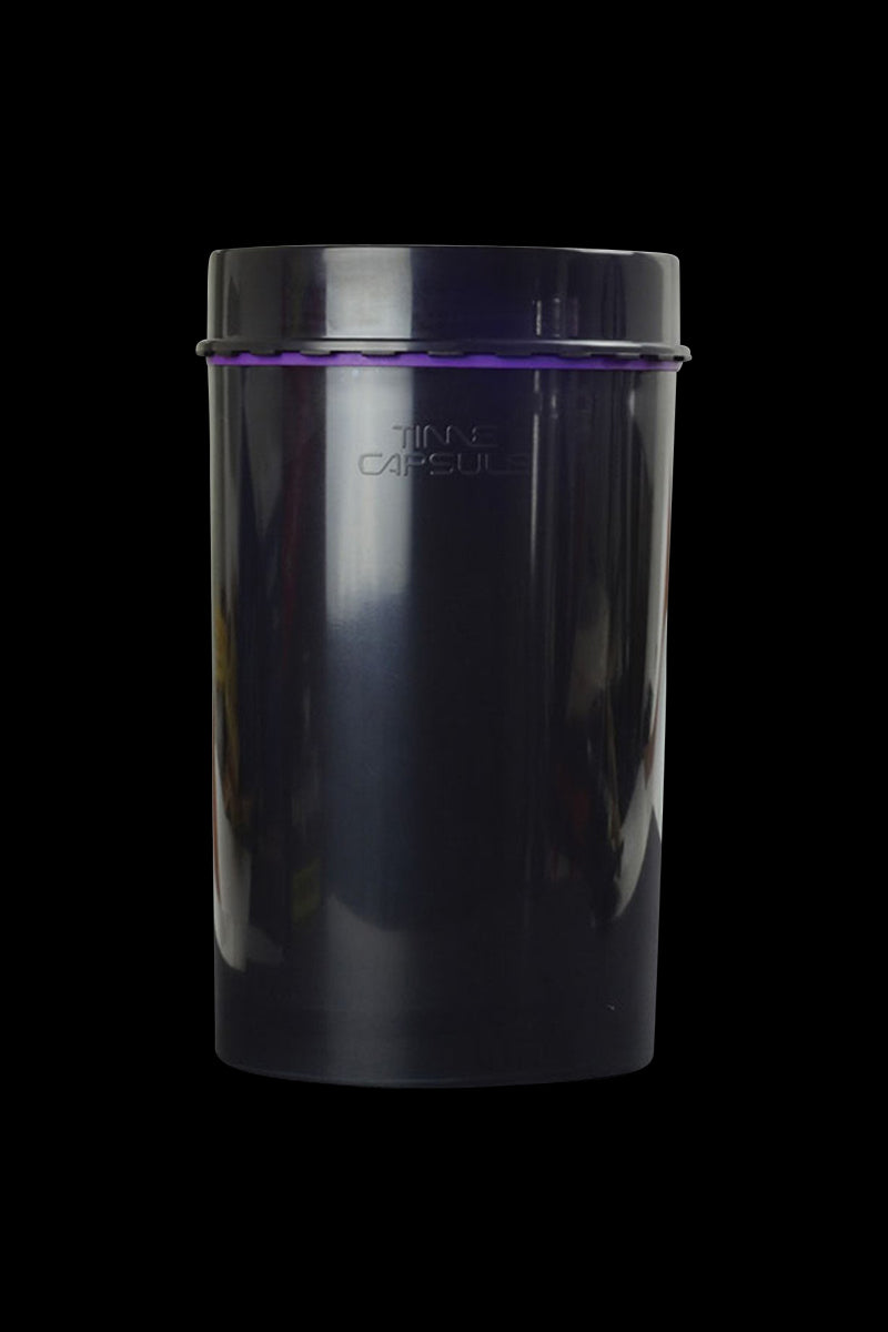 Front view of the "Time Capsule" sealable storage device, a dark, cylindrical container on a plain background.