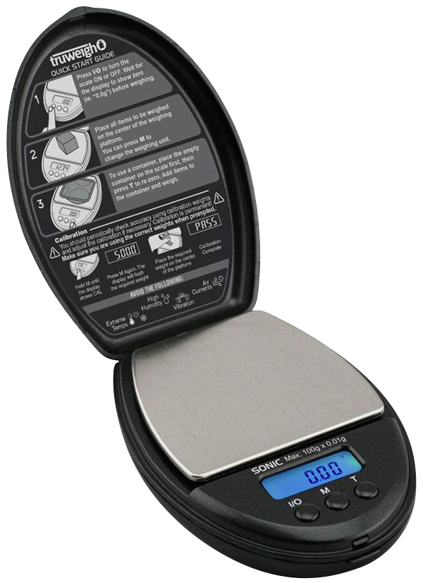A close-up, angled view of the Truweigh Sonic Digital Mini Scale, displaying a digital readout on its black surface.