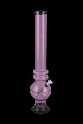 Pink glass water pipe against a black background.