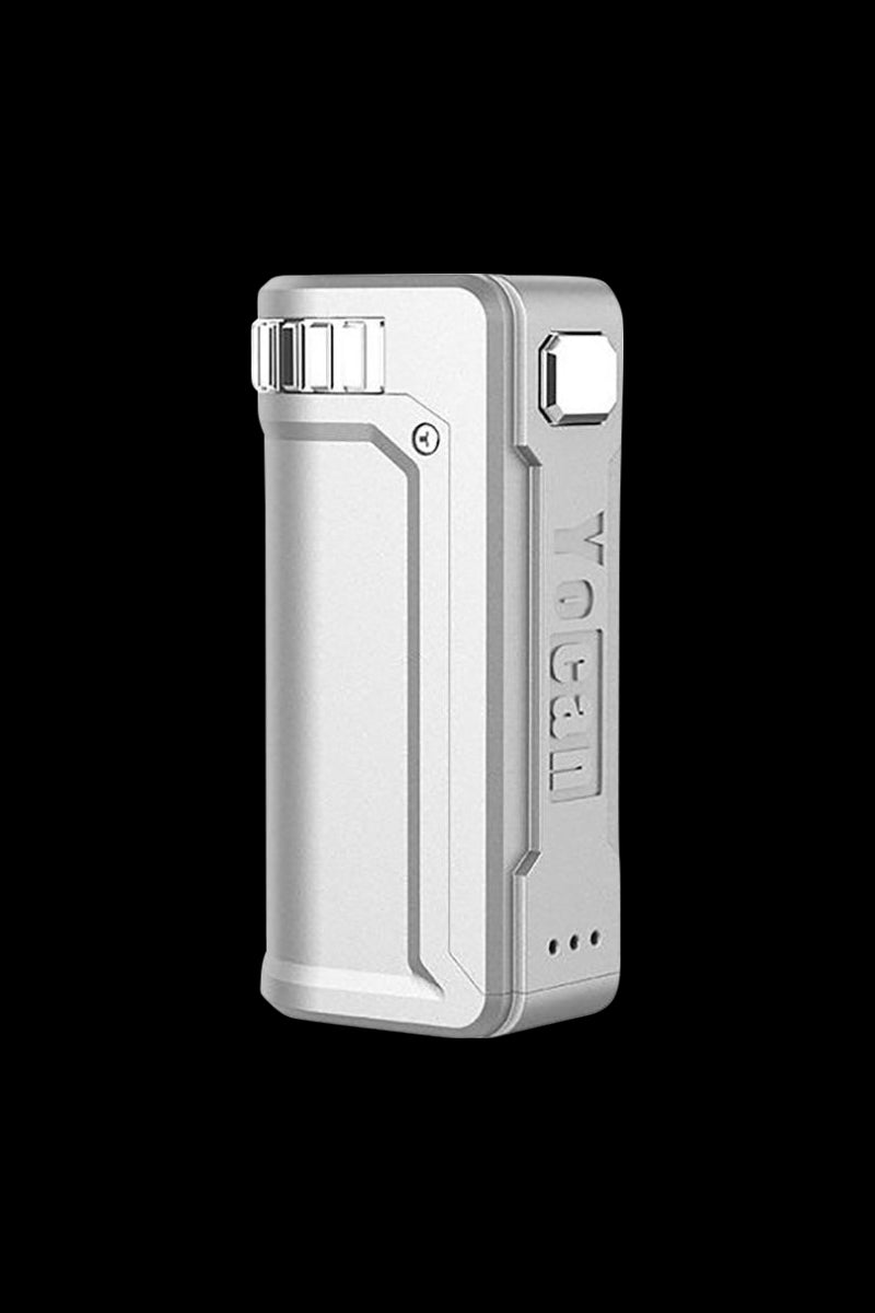 Three-quarter view of the Apple Green Yocan UNI S Portable Box Mod against a black background, showing the textured side panel, top dial, and hexagonal button.
