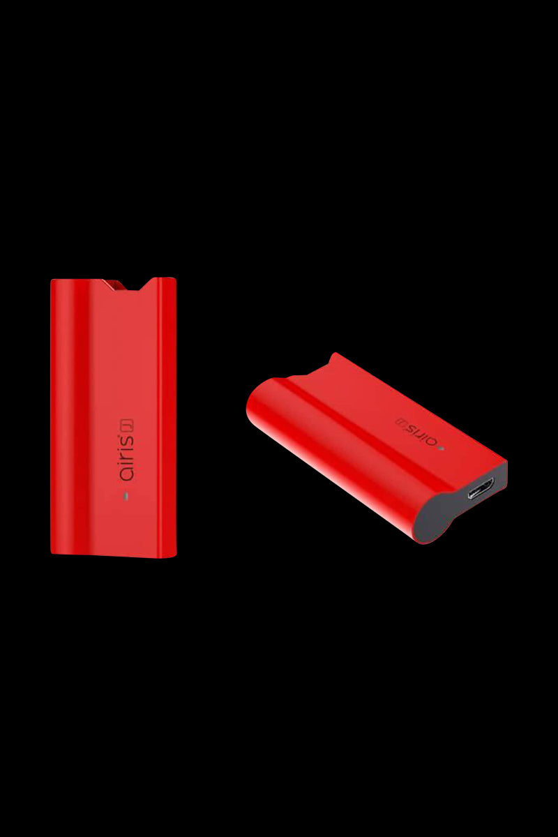 Two angled views of a red Airis J Salt & E Juice Vaporizer against a black background, one standing upright and one lying flat showing the USB port.