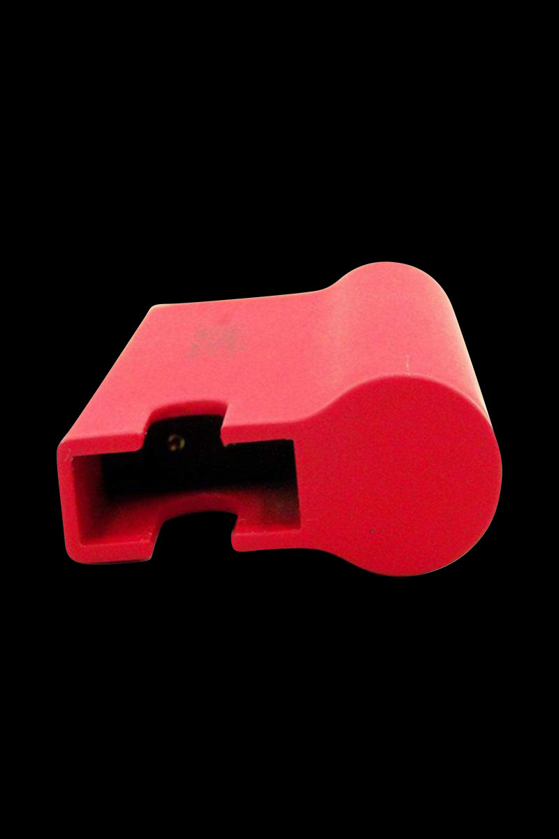 Close-up front view of the red Airis J Salt & E Juice Vaporizer cartridge housing against a black background.