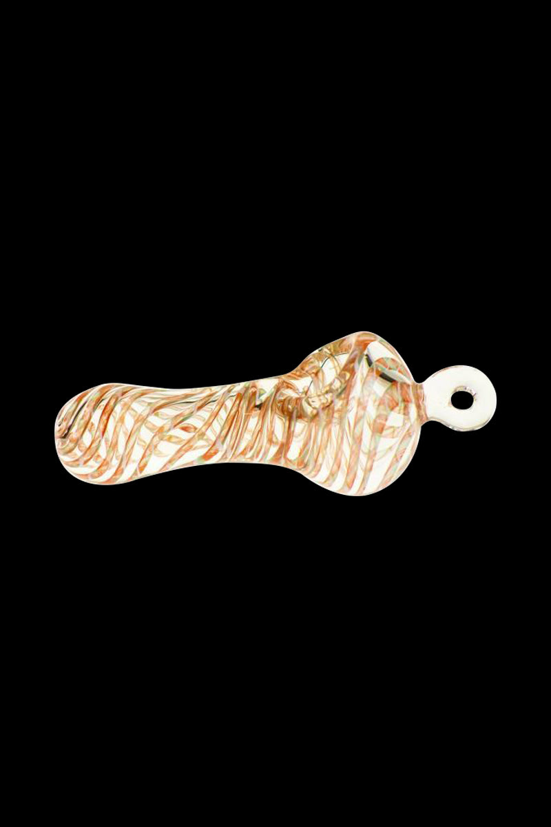 Angled top-down view of the Spiral Beast Pendant Spoon Pipe showing orange spiral filaments in clear glass against a black background.