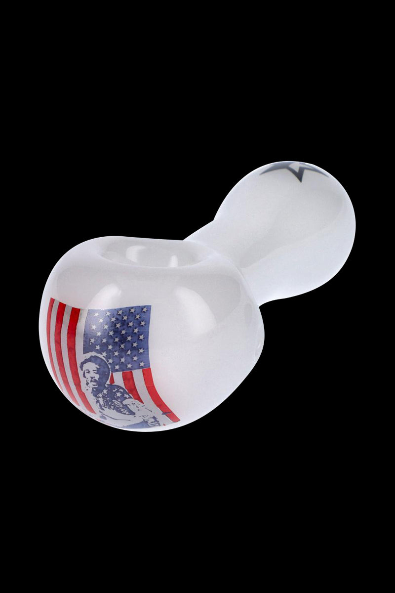 Angled view of the Rock Legends "Jimi USA" Spoon Pipe showing its white glass bowl with an American flag and Jimi Hendrix portrait decal against a black background.