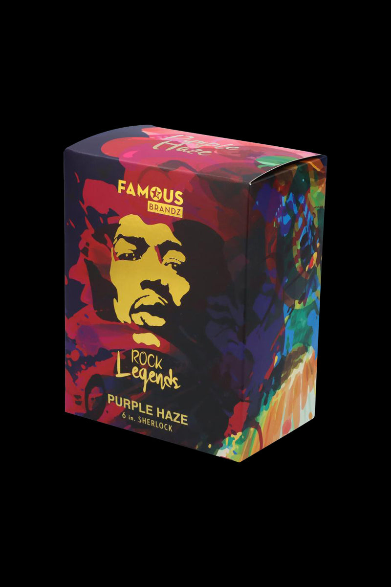 Three-quarter view of the colorful box for the Rock Legends Sherlock Hammer Pipe - Jimi Purple Haze, showing a stylized purple and gold portrait and vivid abstract art.