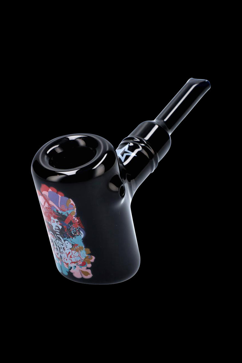 Angled close-up of the Rock Legends Sherlock Hammer Pipe - Jimi Rainbow Haze showing its glossy black glass, short stem, and colorful psychedelic decal on the bowl