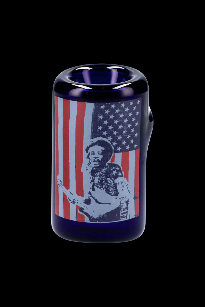 Centered front view of the Rock Legends Sherlock Hammer Pipe - Jimi USA showing a cylindrical deep blue glass body printed with a stylized Jimi Hendrix silhouette over a faded American flag.