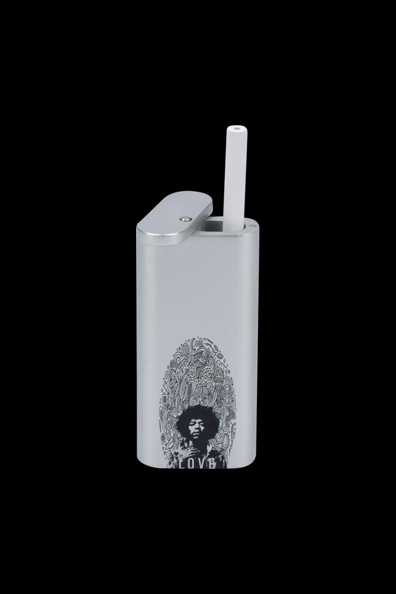 Front view of the Rock Legends "Jimi Love" Aluminum Dugout showing its silver finish, hinged top open and a white cylindrical stick seated inside over a black background
