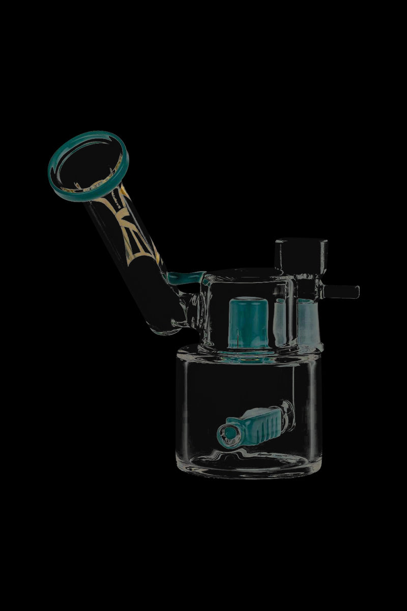A three-quarter view of the Evolution Morning Glory Sidecar Dab Rig, showcasing its clear glass construction and unique sidecar attachment.