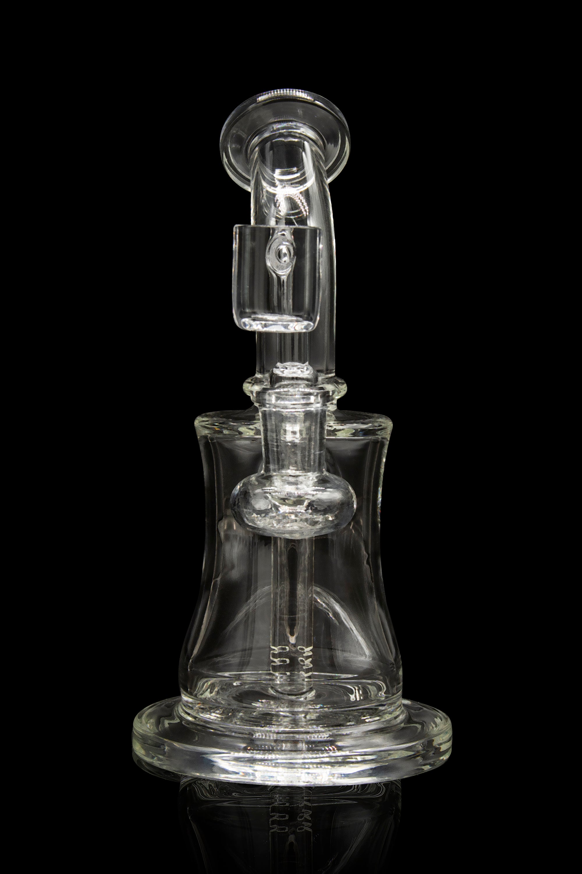 Clear glass water pipe (rig) with intricate design, isolated on a black background.