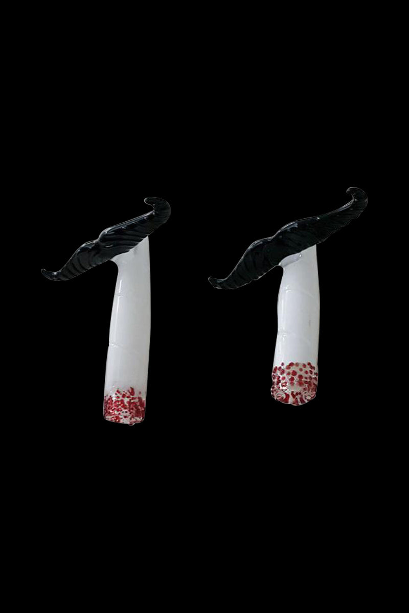 A studio shot of the Mustache Cig One Hitter, showcasing its clean lines and minimalist design against a stark black background.