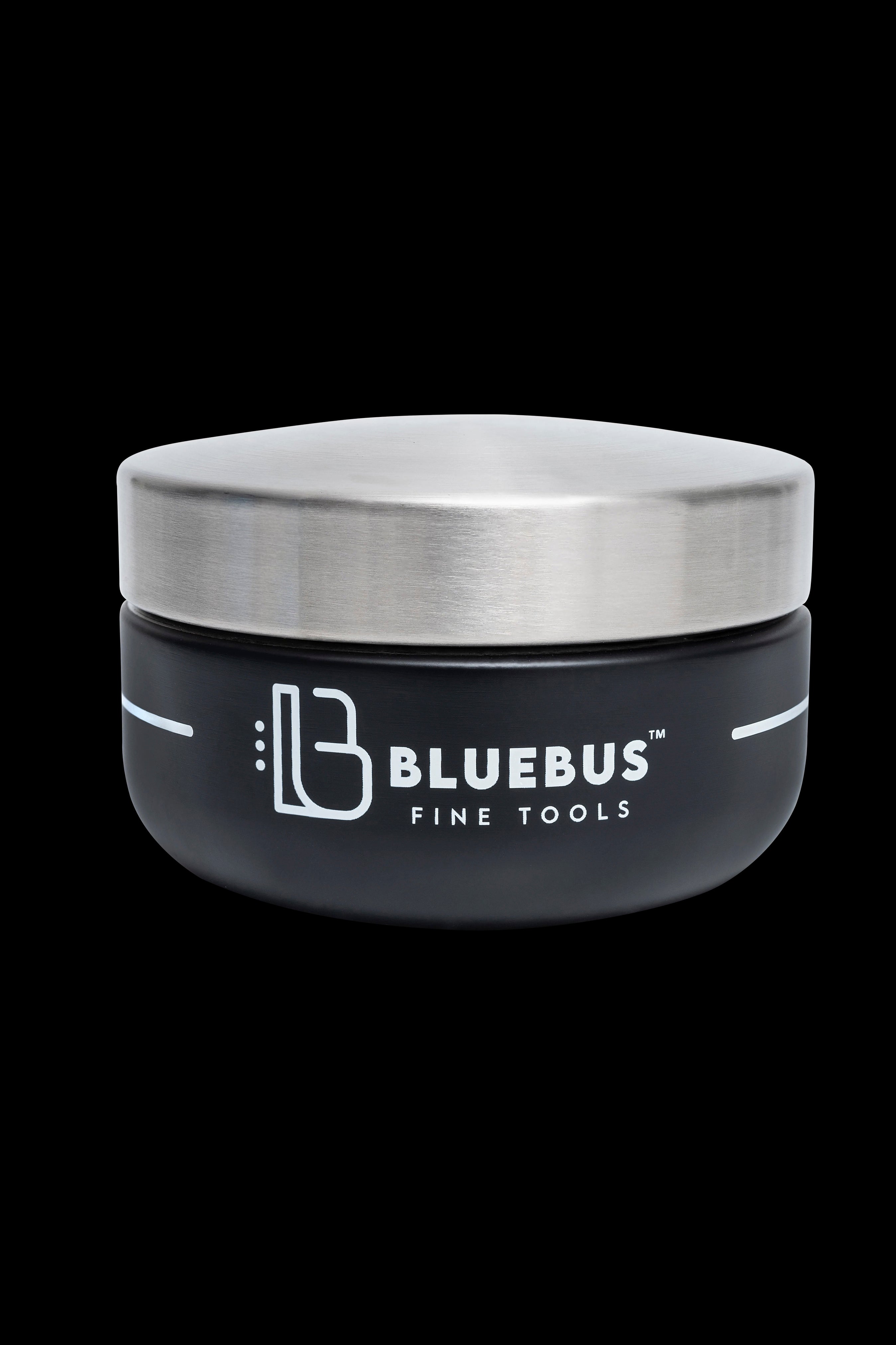 Silver cannabis storage container with “Bluebus Fine Tools” logo on a black background.