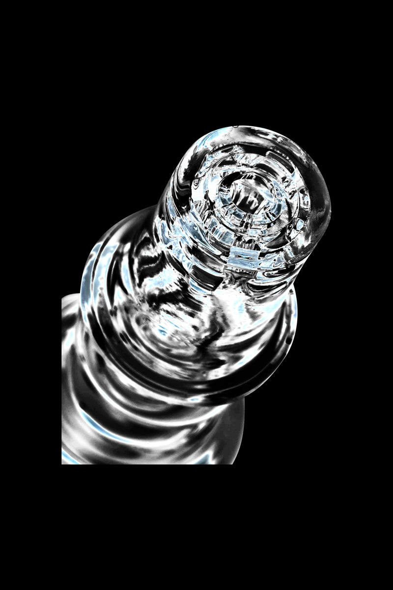 Close-up angled view of the clear Diamond Knot Domeless Nail showing its spiral top and glossy ridged shaft against a black background.