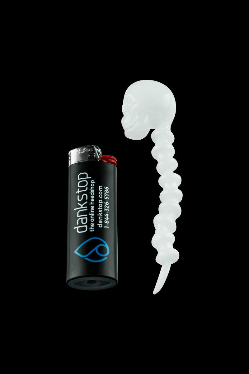 A close-up of the Fatality Dabber on a black background, highlighting its metallic finish and sleek design.