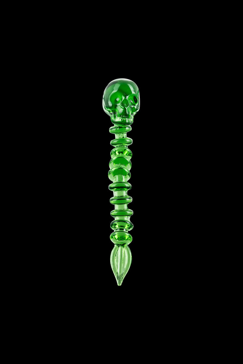 Fatality Dabber shown in a studio shot, highlighting the sleek green glass tool angled against a black backdrop.