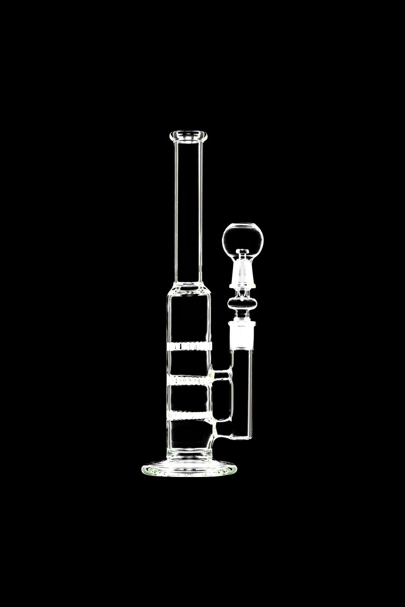 Close-up of the Male to Male Glass Adapter, a clear glass connector angled slightly against a dark background.