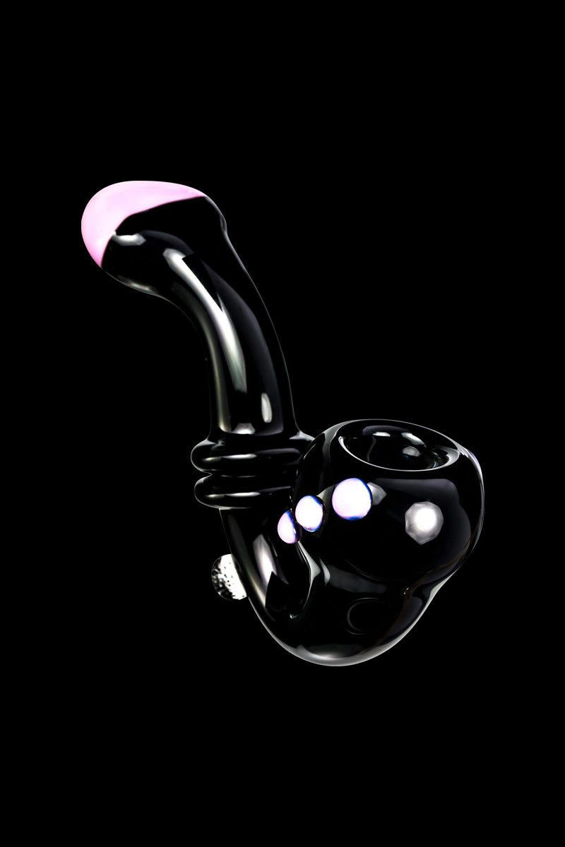 Angled studio shot of the Maria Ring Sherlock Pipe showing a glossy black curved stem and bowl with a pink-tipped mouthpiece and three pink accents.