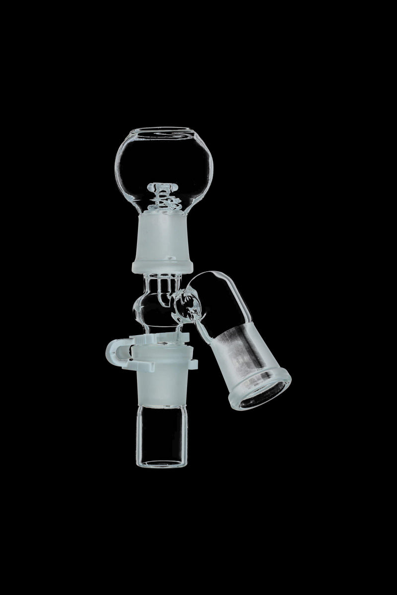 Centered close-up of the clear glass Reclaim Catcher suspended against a black background showing its 45° angled joint and frosted connectors.