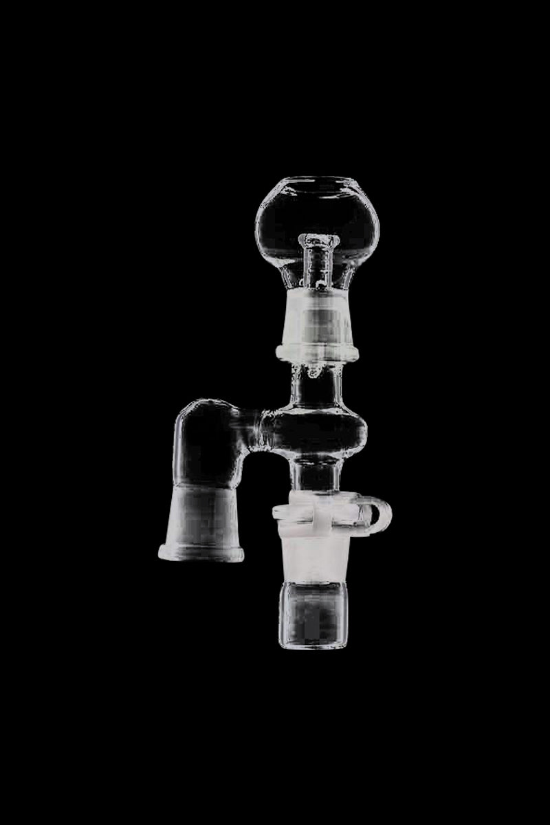 Centered front view of the clear Reclaim Catcher against a black background showing its bulbous top and angled side joint.