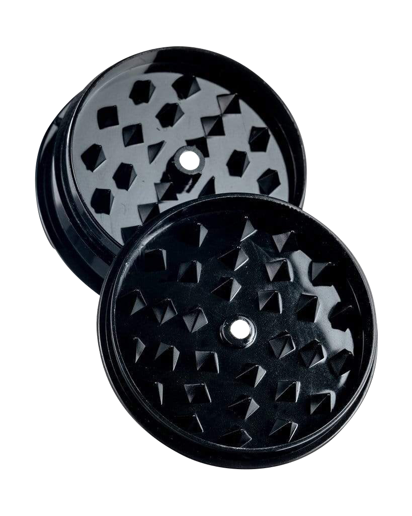 Front view of the Travel Herb Grinder & Stash Jar, showing a dark, multi-tiered grinder and clear storage jar against a plain white backdrop.