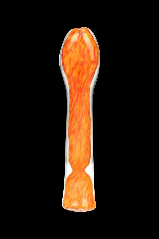 Orange glass cannabis water pipe against a black background.