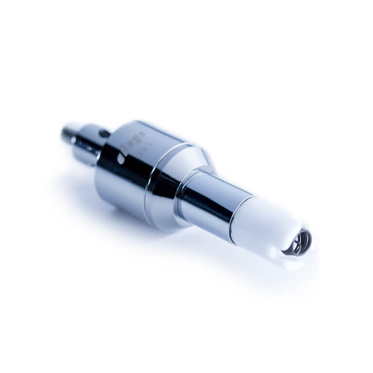Angled close-up of a chrome Dip Devices Dipper Vapor Tip Atomizer lying on a white background, highlighting its polished metal body and white ceramic tip.