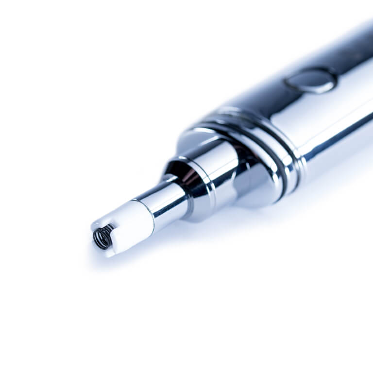 Close-up angled view of the chrome Dip Devices Dipper Vapor Tip Atomizer showing the threaded white ceramic tip and reflective body on a white background.