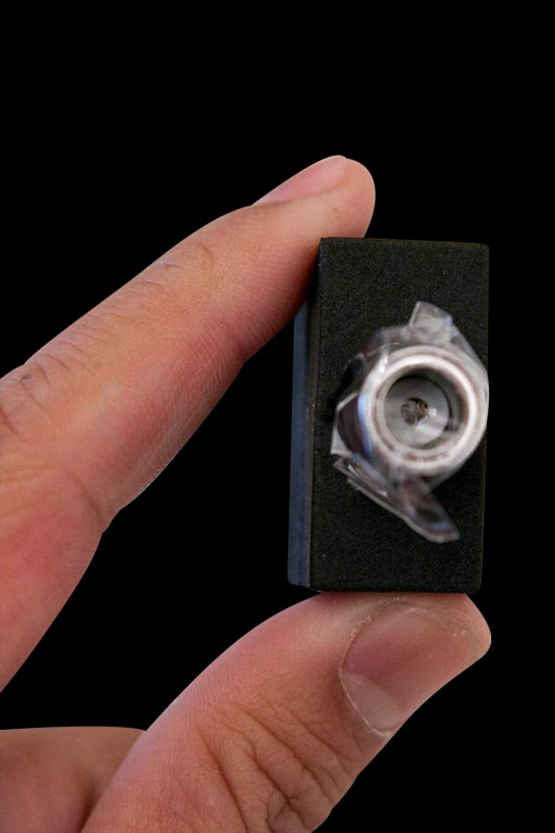 A close-up shows the Aurora Halo Ceramic Quartz Atomizer held against a dark background, highlighting its small size.