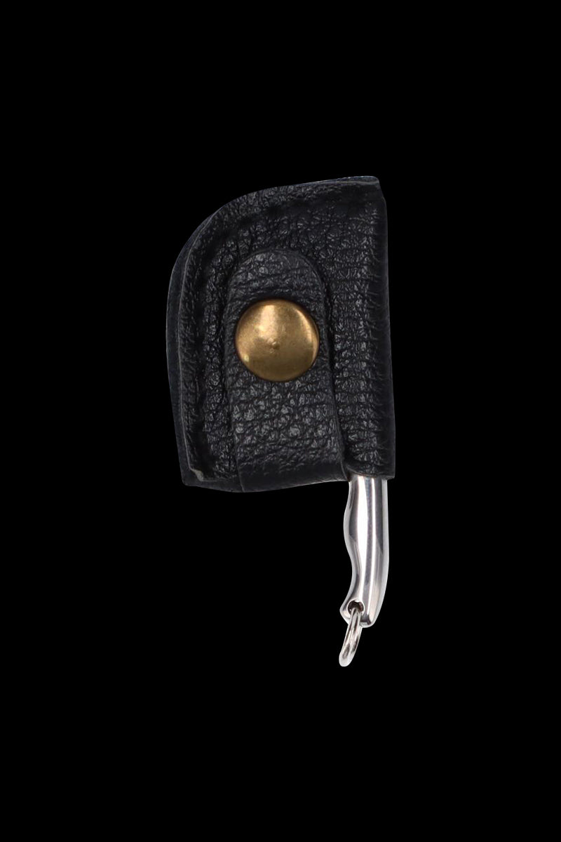 Close-up profile of the THGC EX II Mini Chopping Knife with Cover showing its black textured leather sheath with brass snap and the knife's curved stainless clip against a black background