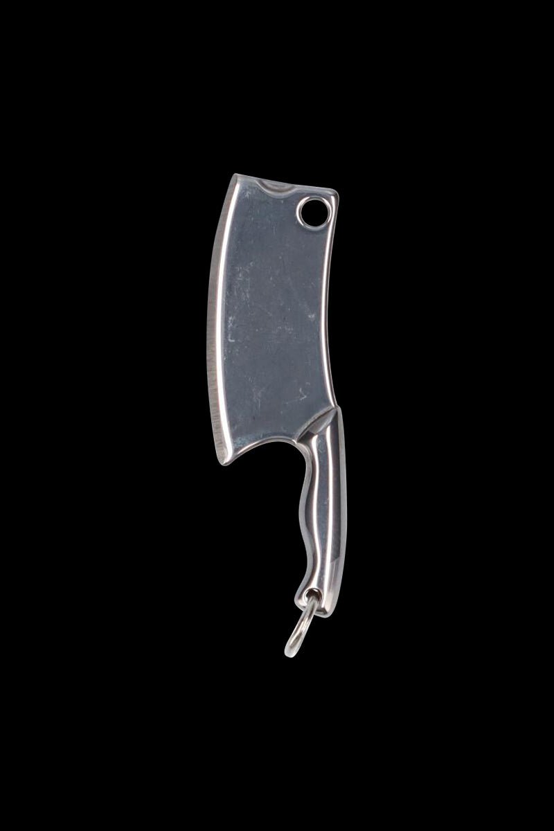 Top-down view of the silver THGC EX II Mini Chopping Knife with Cover against a solid black background, showing its cleaver-shaped blade, finger hole, and curved handle with keyring.