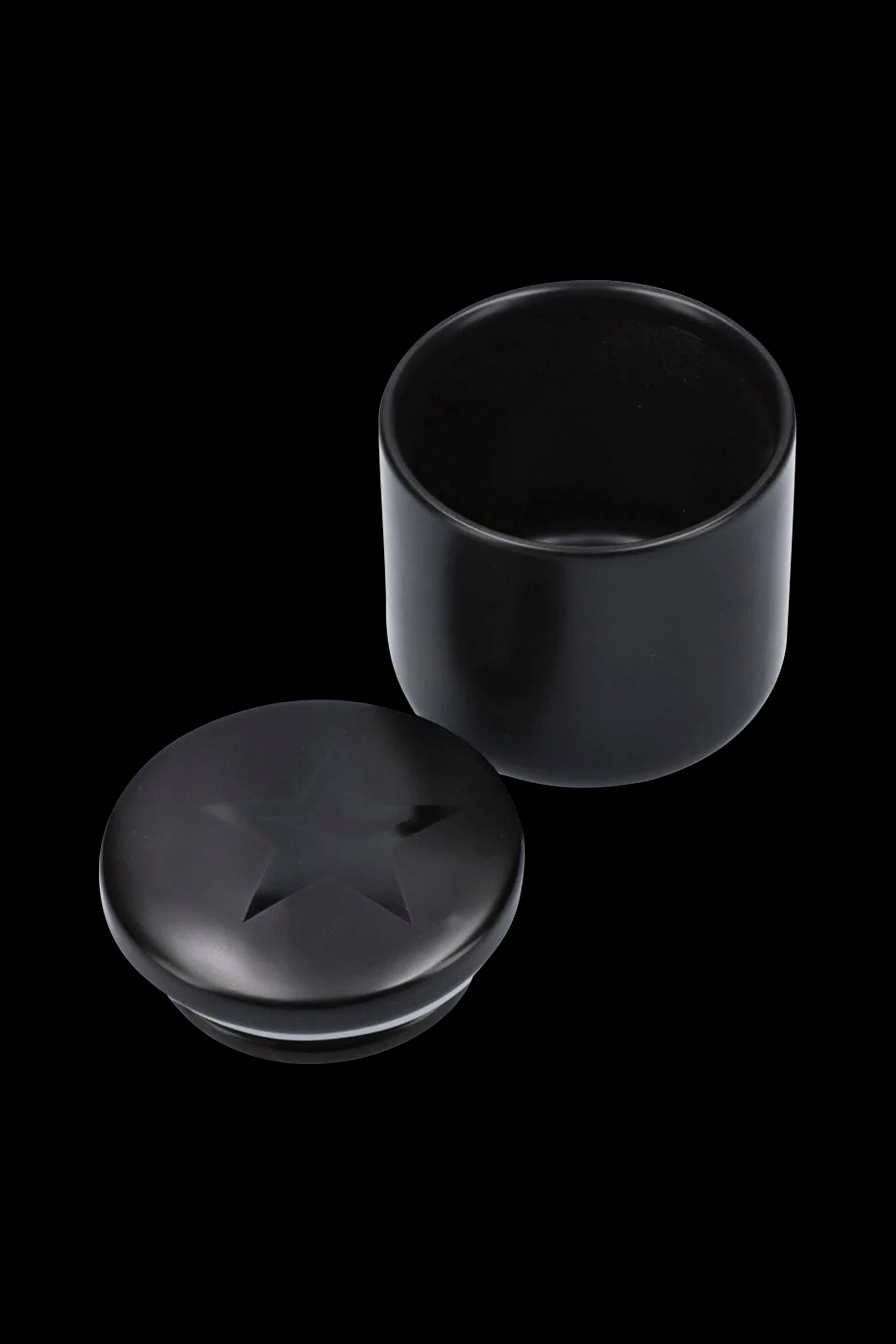 Black cannabis storage jar with lid separated.