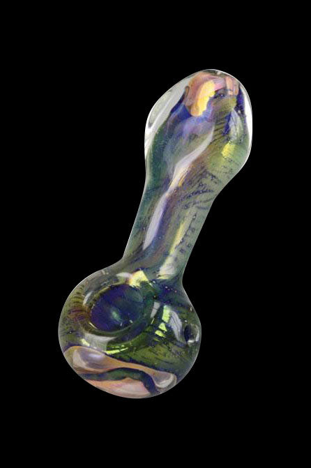 Iridescent glass pipe against a black background.
