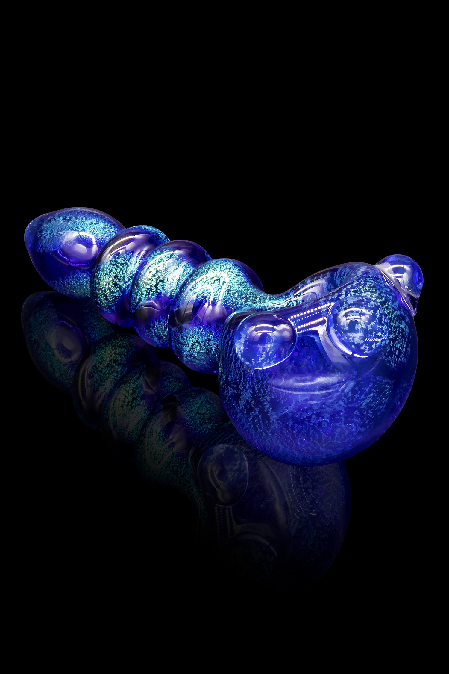 Blue glass bubbler pipe with swirling patterns, isolated on black.
