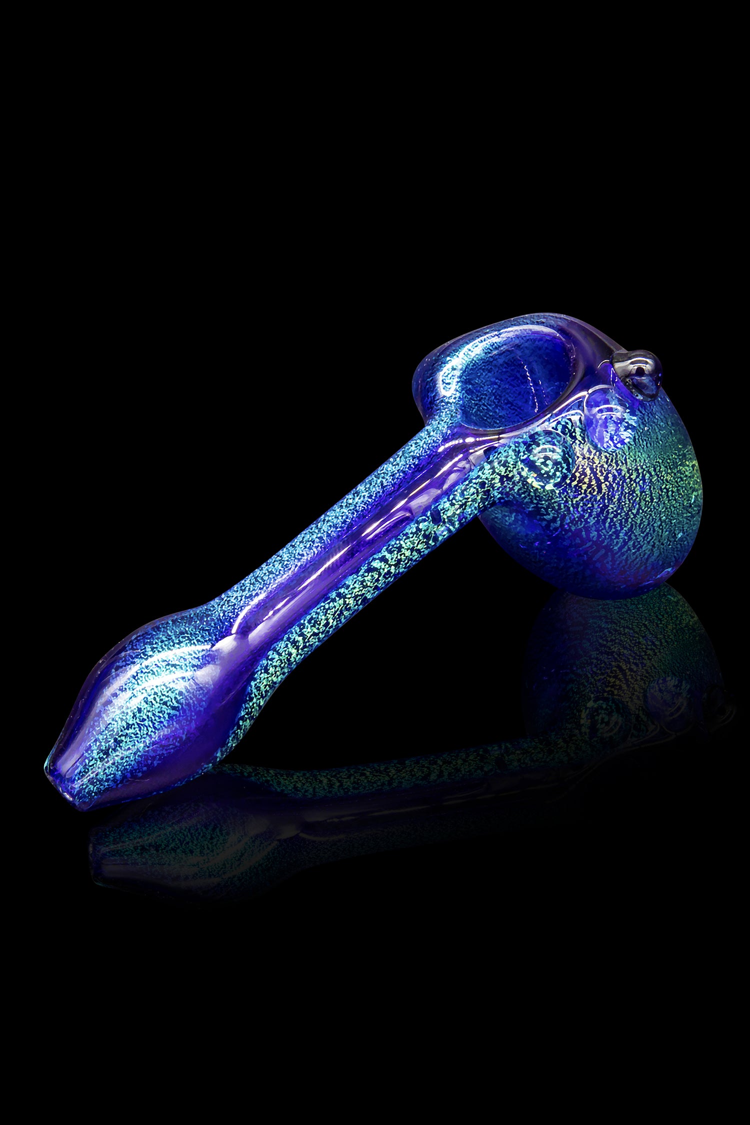 Blue glass pipe with speckled texture, studio shot.