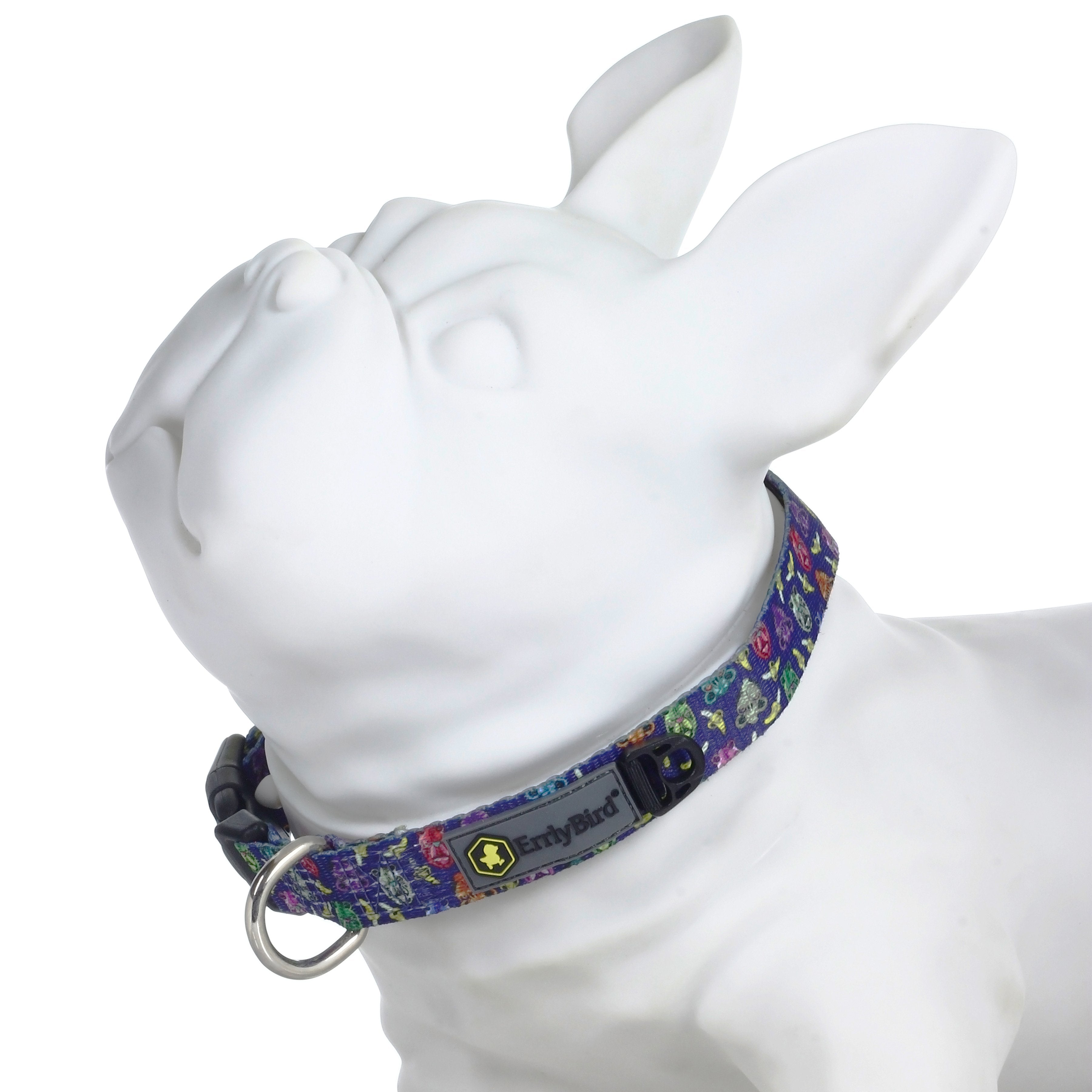A close-up, angled view showcases the HeadyPet OG Collar, featuring a vibrant, patterned design against a blurred background.