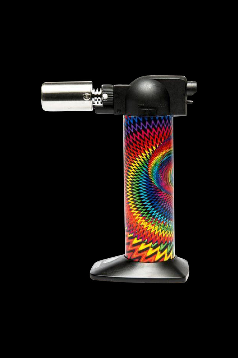 Side view of the Newport Butane Torch Lighter - 6 Inch standing upright on a black background, showing its rainbow spiral patterned body and metal nozzle.