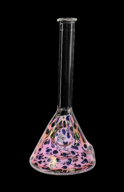 Centered front view of the UPC Inside-Out Fumed Beaker Spoon Pipe with a tall clear neck and a pink, spotted beaker base on black.