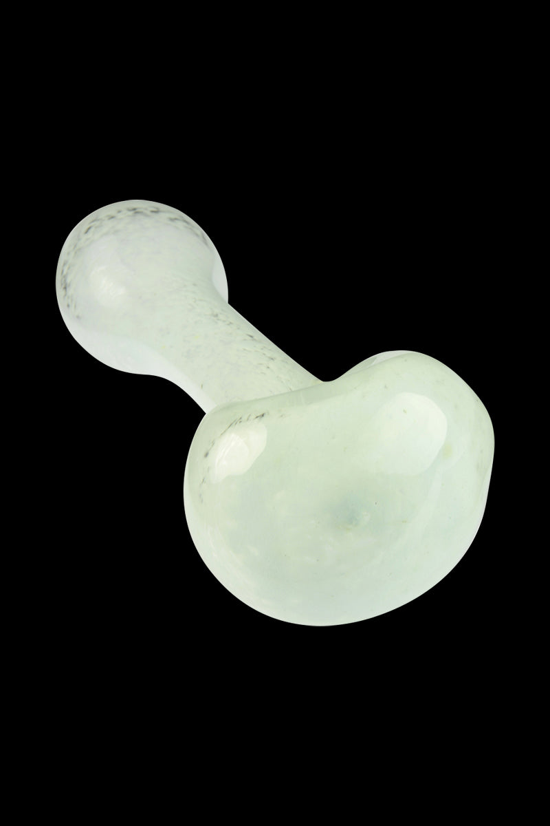 Angled top-down view of the Glassheads Spoon Pipe with Scatter Frit showing its pale, frosted glass bulb and rounded handle against a black background.