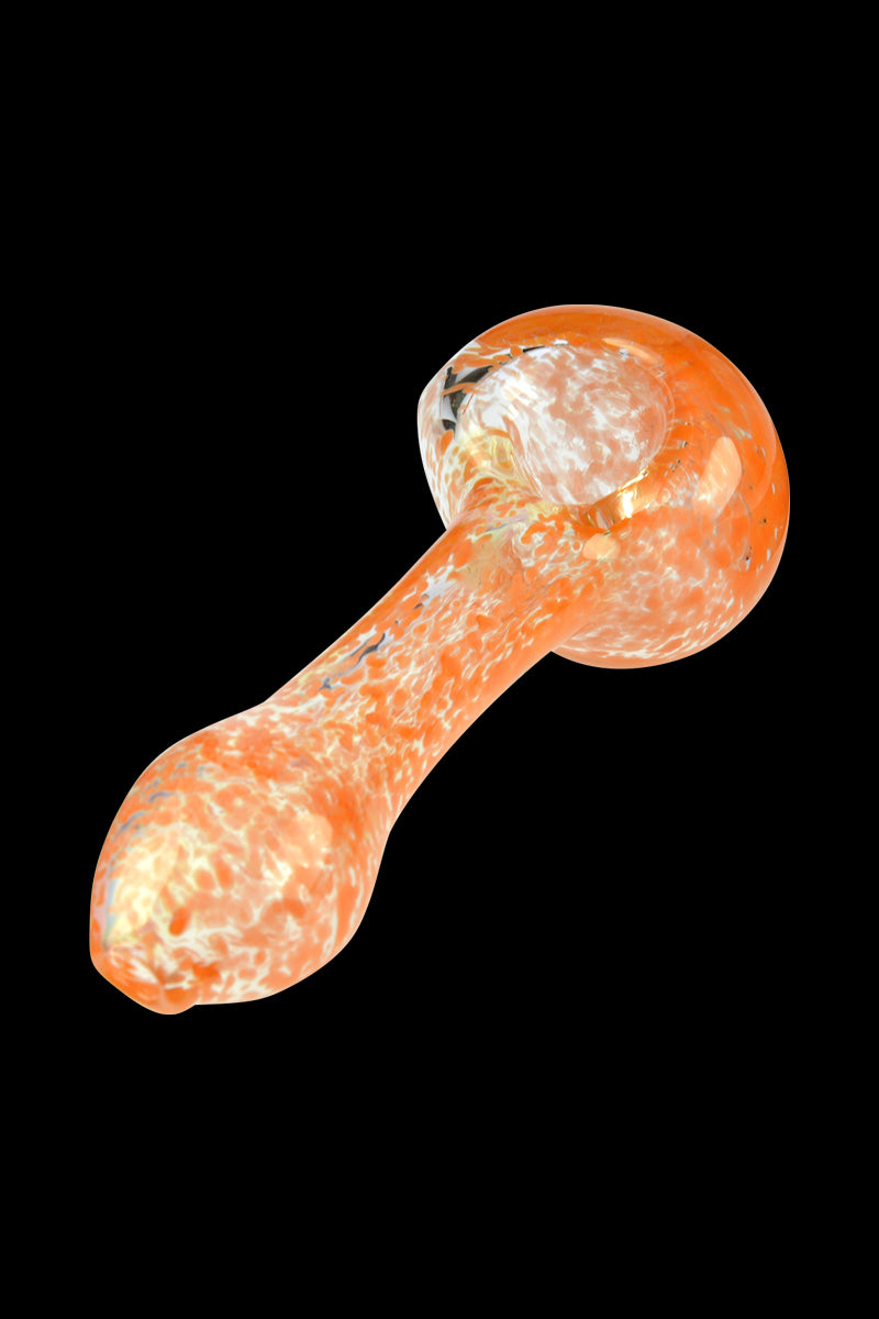 Angled close-up of the Glassheads Spoon Pipe with Scatter Frit showing its orange-and-white speckled bowl and stem against a black background