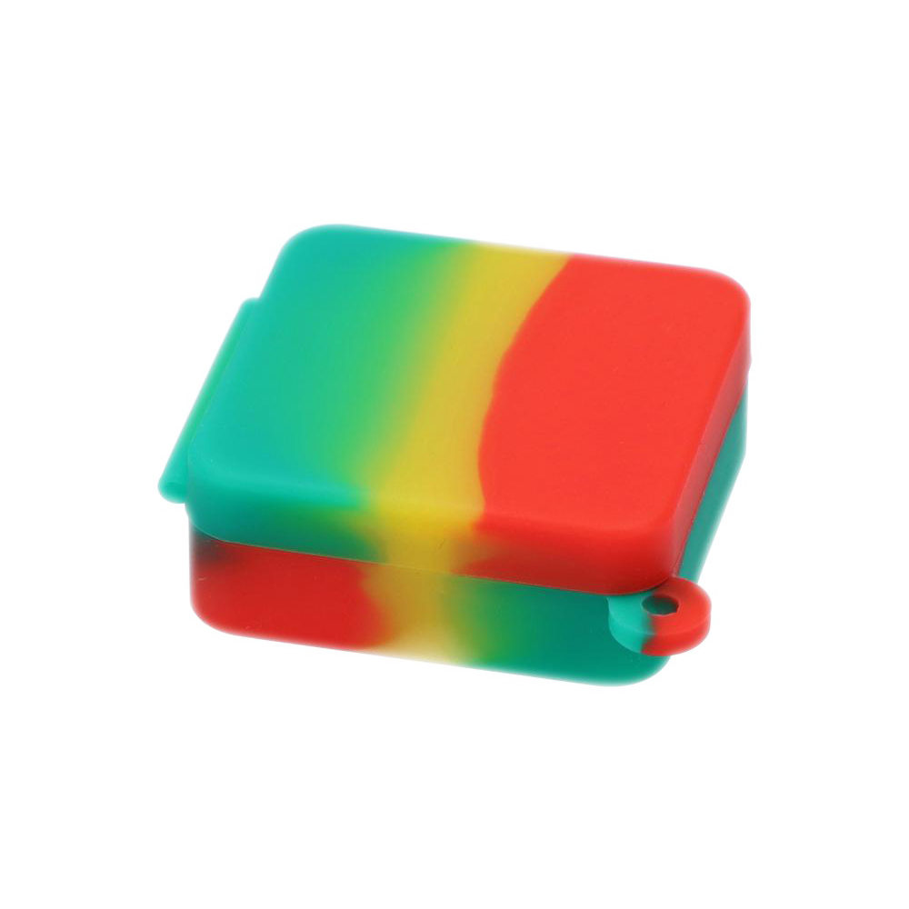 Three-quarter view of a red, yellow, and green silicone square Keychain Stash Container showing the hinged lid and small keyring loop.