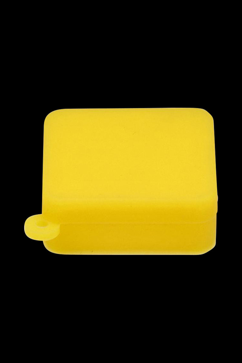Front-facing view of a bright Rasta silicone Square Keychain Stash Container against a black background, showing its rounded corners and small loop.