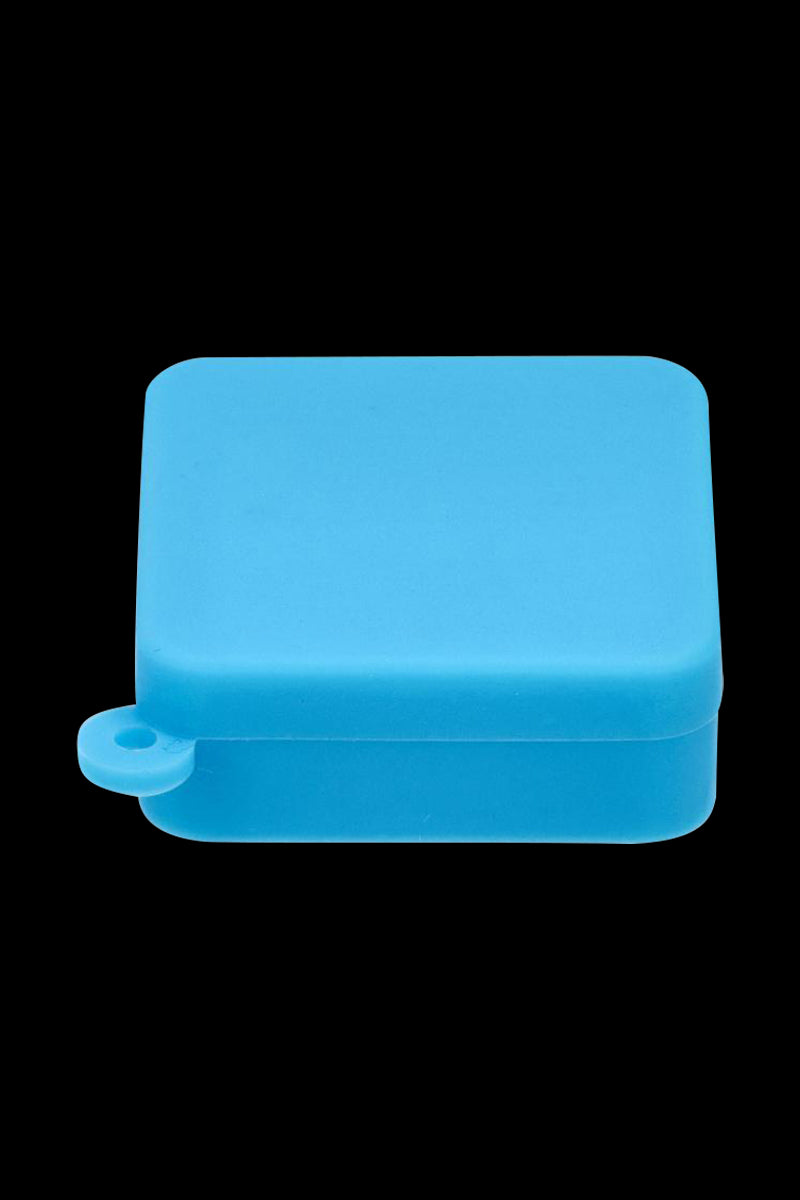Front-facing close-up of a blue Silicone Square Keychain Stash Container against a solid black background.