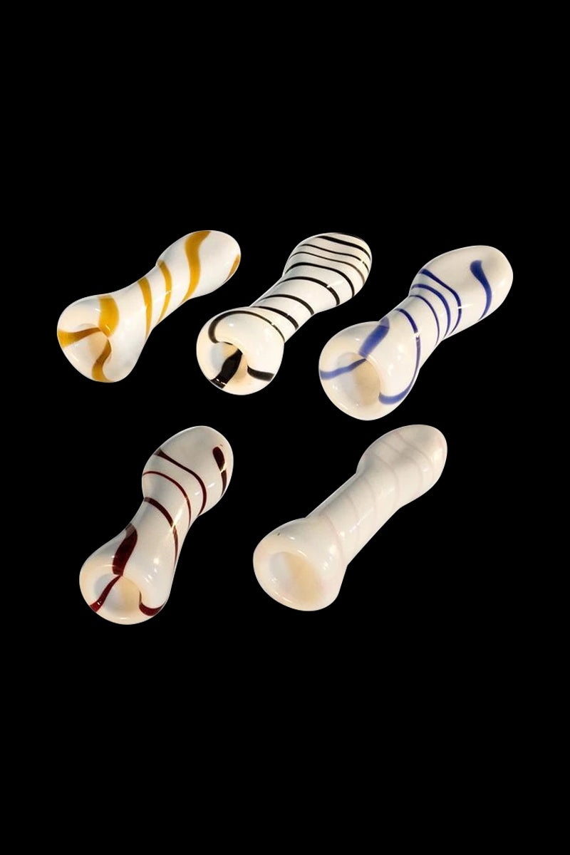 A close-up shot of the White Glass One Hitter Pipe with Stripes, angled diagonally against a plain black background.