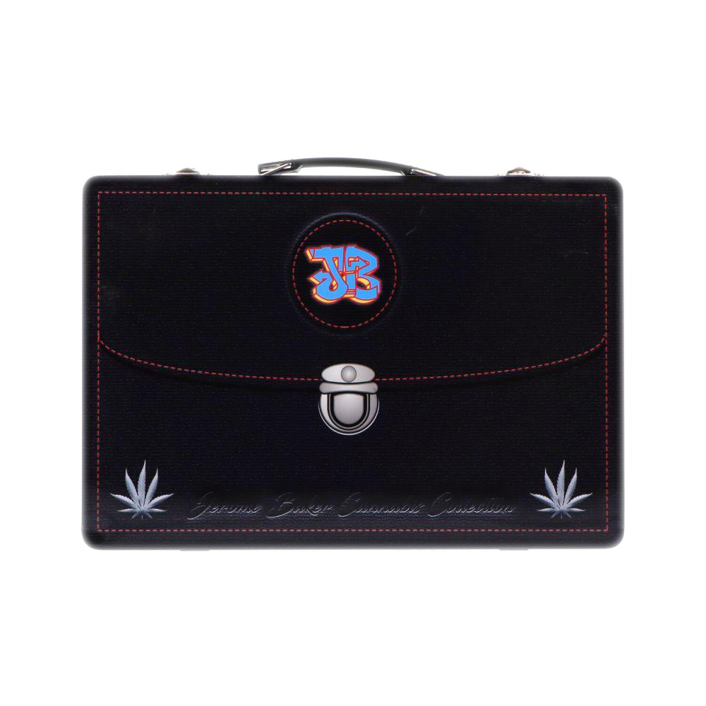 Front-facing shot of a black Jerome Baker Lunch Box with red stitching, a centered graffiti-style JB logo, silver latch, and two leaf motifs.