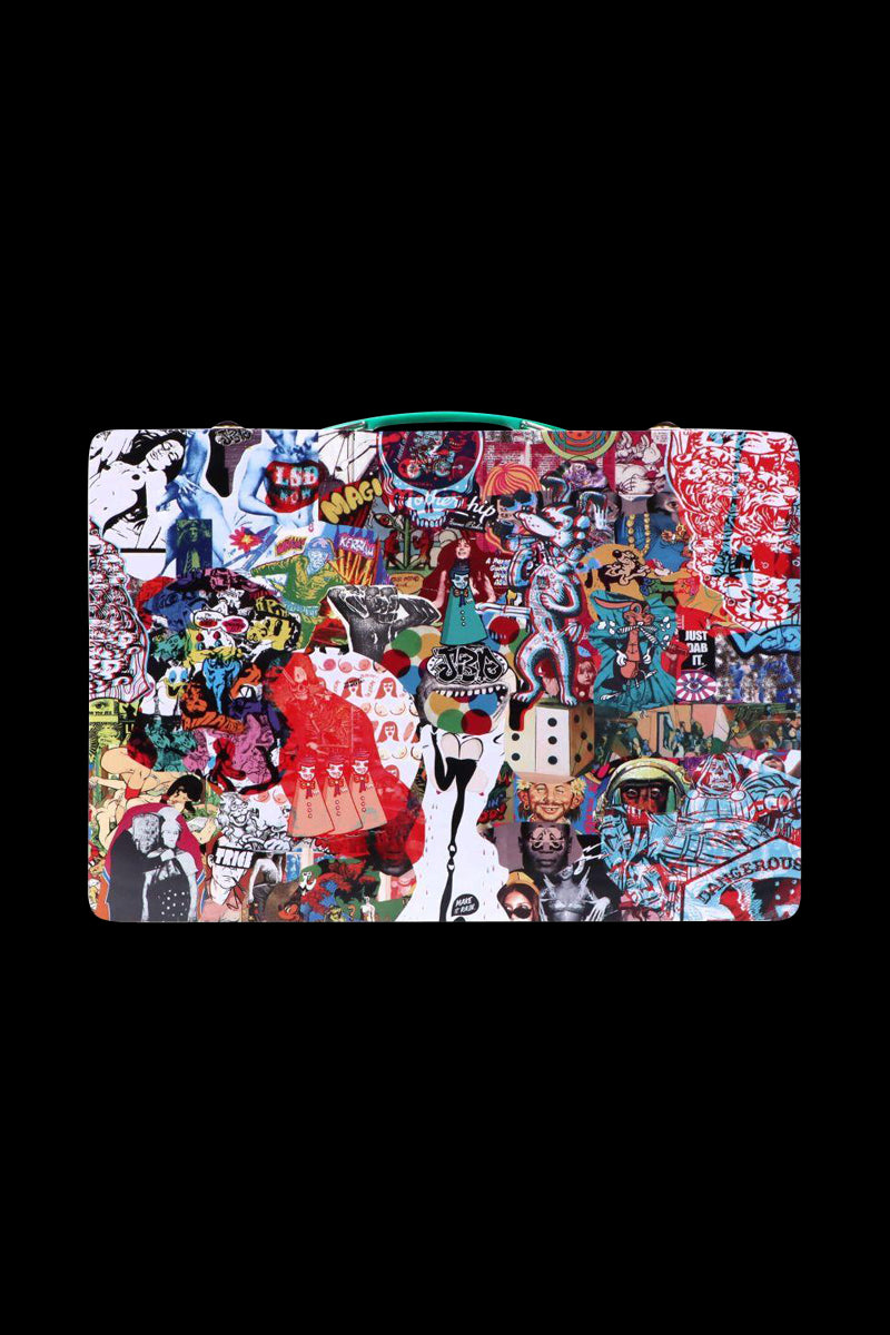 Top-down view of the Jerome Baker Lunch Box with a colorful collage of stickers and pop-art images against a black background