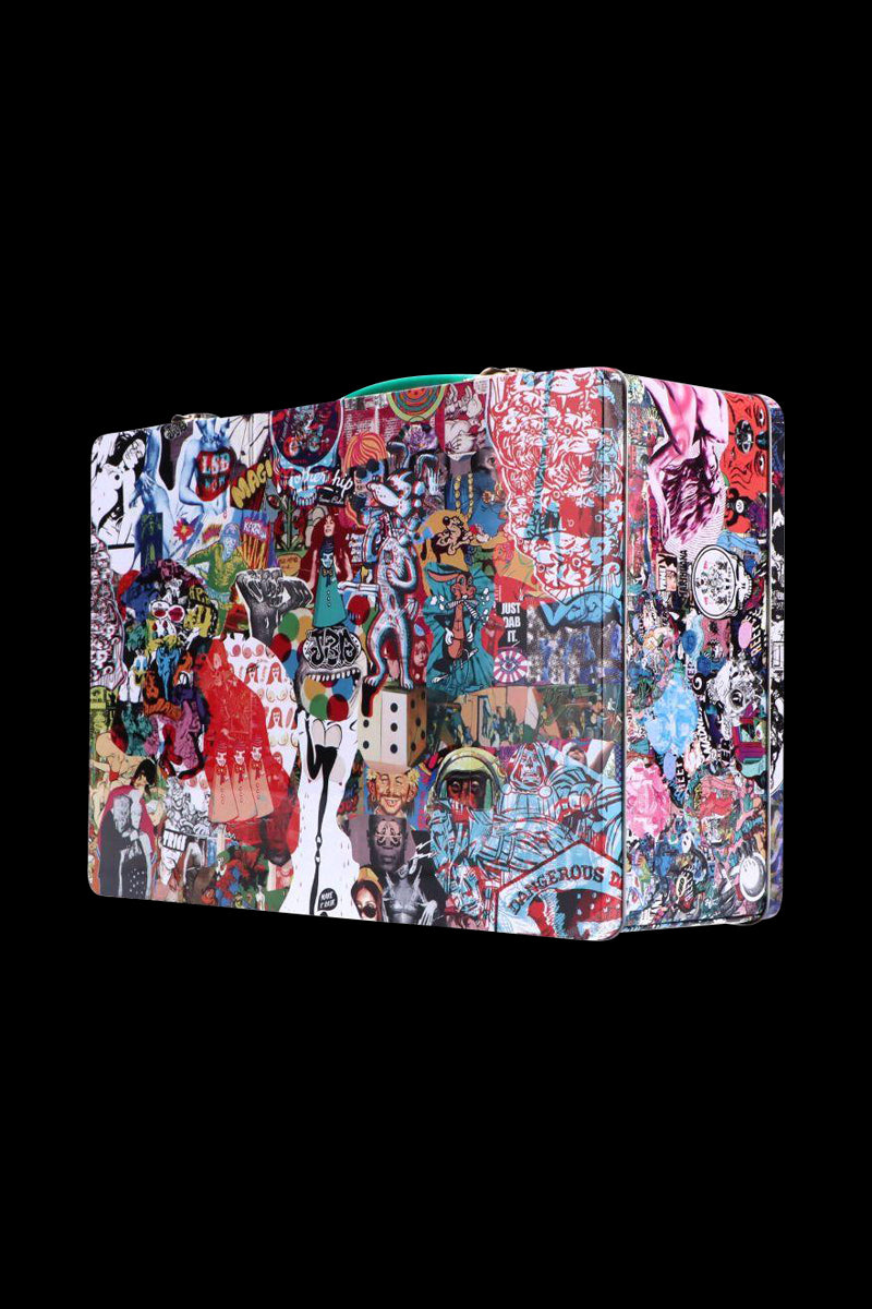 Three-quarter view of a colorful, sticker-collage Jerome Baker Lunch Box against a solid black background.