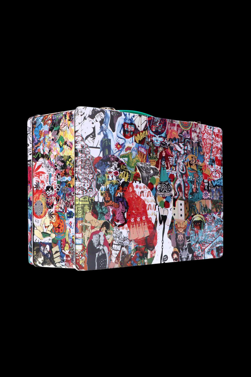 Angled front view of the Jerome Baker Lunch Box covered edge-to-edge in a chaotic collage of colorful stickers and illustrations against a black background