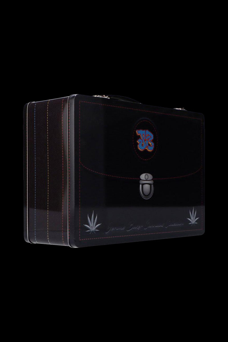 Three-quarter view of the black Jerome Baker Lunch Box with colorful JB logo above a silver latch and stitched edges against a black background